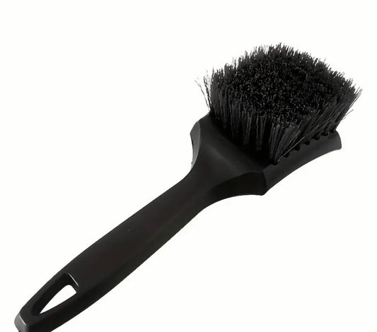 Tire and plastic brush